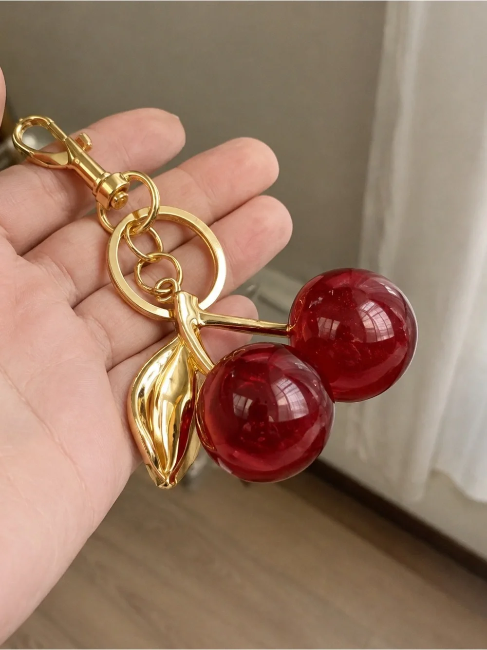 Coach Gold-tone Cherry Keychain with Red Lucite Cherries